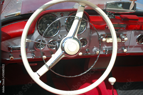 vintage car steeling wheel and dashboard © goce risteski