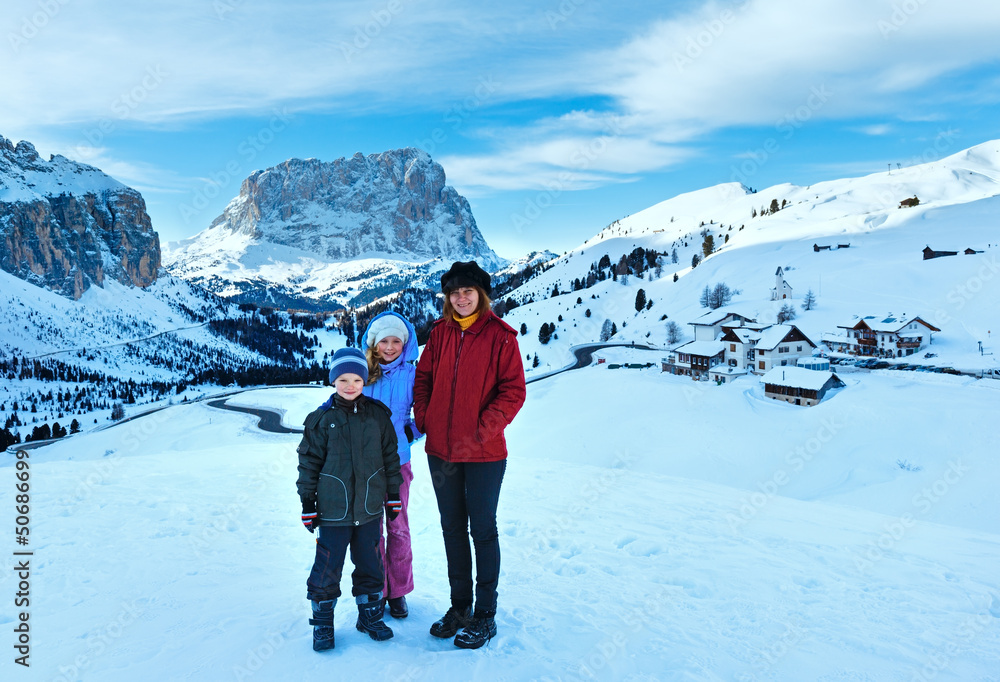 Morning winter Gardena Pass  in Dolomites and family.