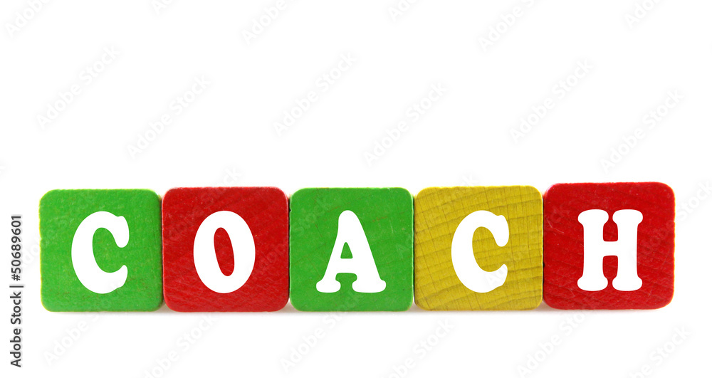 coach - isolated text in wooden building blocks coach - isolated text in wooden building blocks