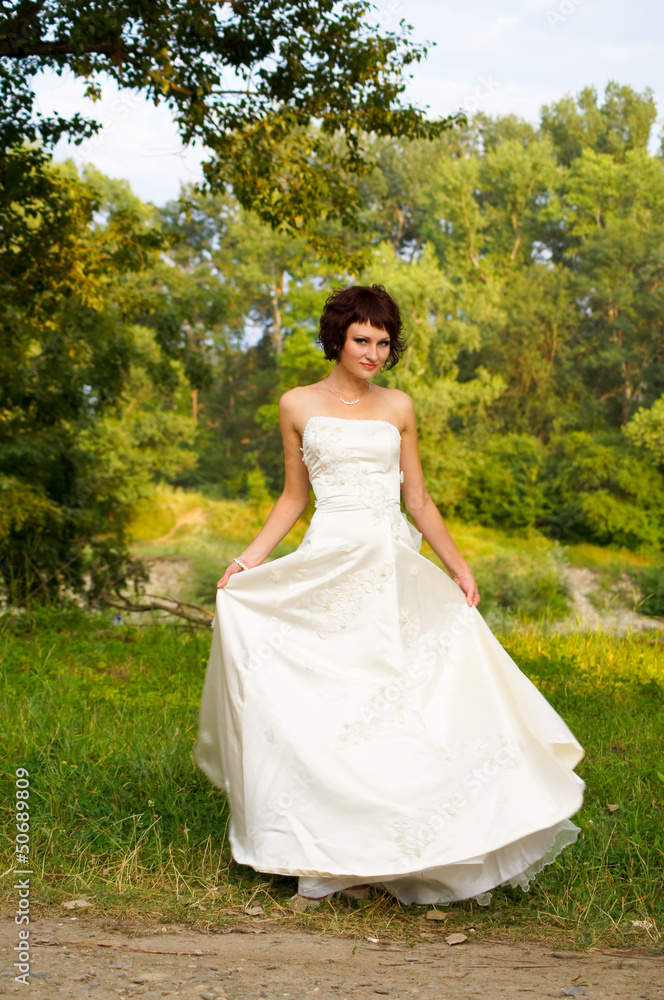 Cute little girl in a wedding dress Cute little girl in a wedding dress