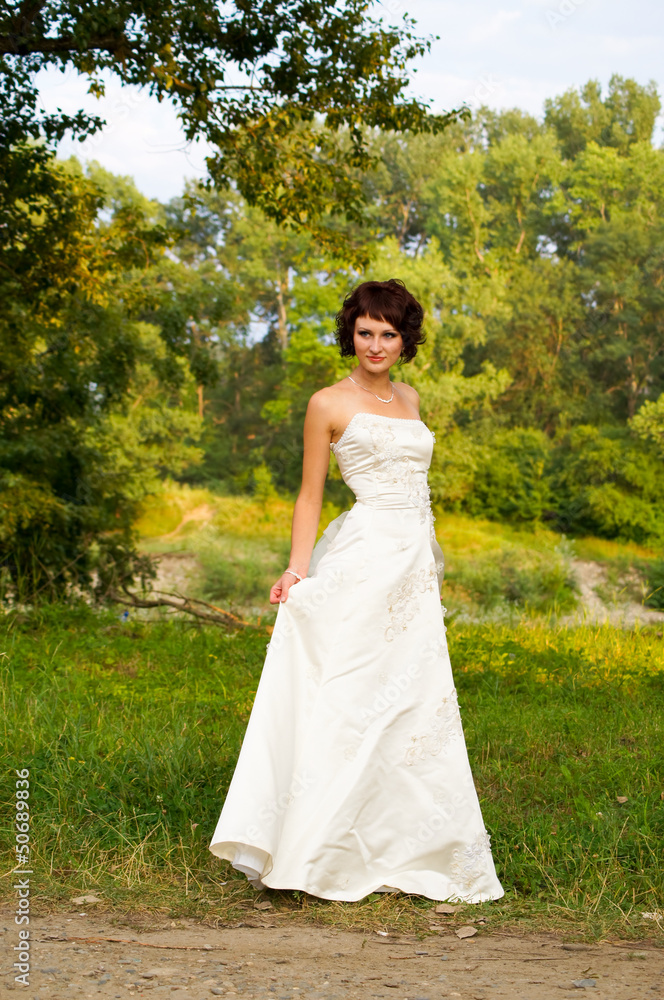 Cute little girl in a wedding dress Cute little girl in a wedding dress