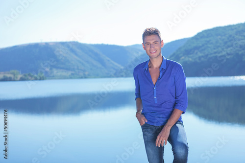 man posing by the lake © Viorel Sima