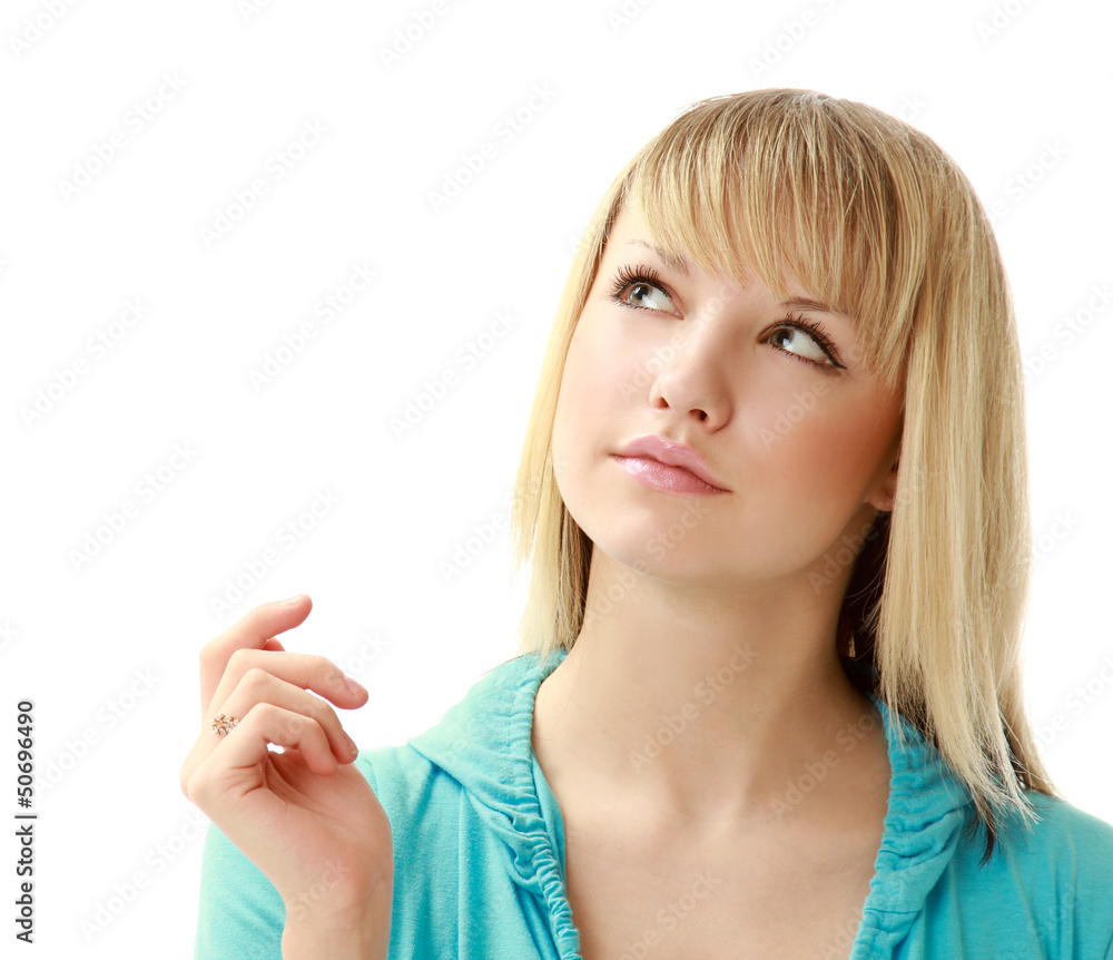A young pensive girl looking up A young pensive girl looking up
