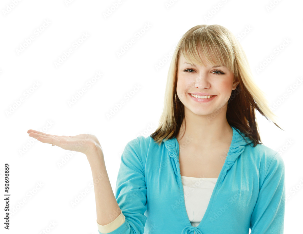 Portrait of a smiling young woman pointing up Portrait of a smiling young woman pointing up