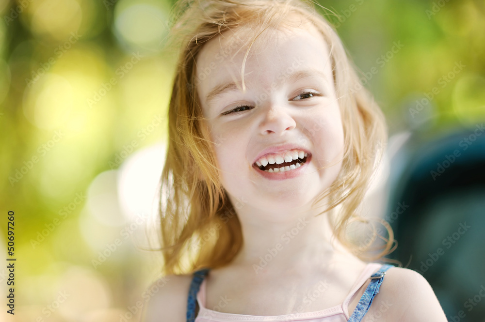 Adorable girl portrait outdoors at summer Adorable girl portrait outdoors at summer