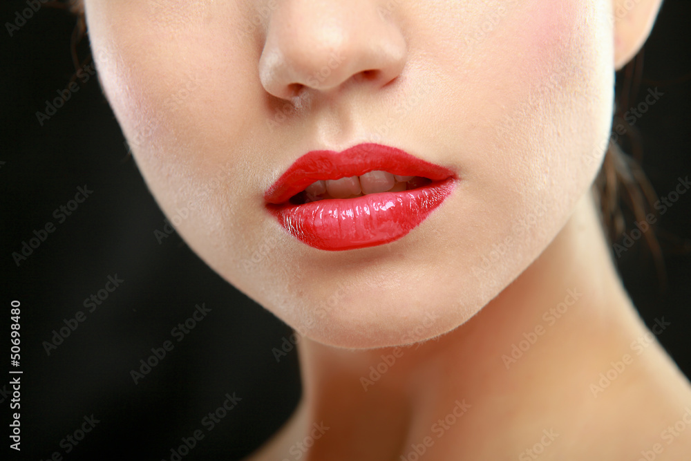 Fototapeta premium Woman red lips closeup