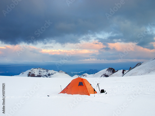 Tourist camp in the snowy mountains. Sport and active life