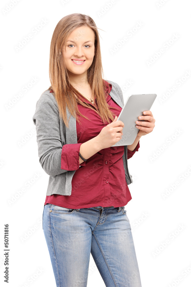 Young female holding a tablet and looking at camera Young female holding a tablet and looking at camera