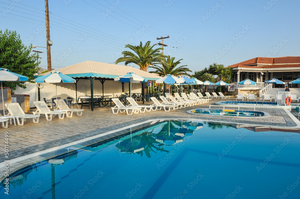 Luxury swimming pool in the tropical hotel in Greece