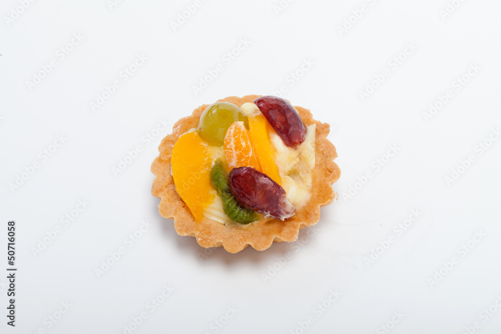 sweet cake with fruits isolated on white sweet cake with fruits isolated on white
