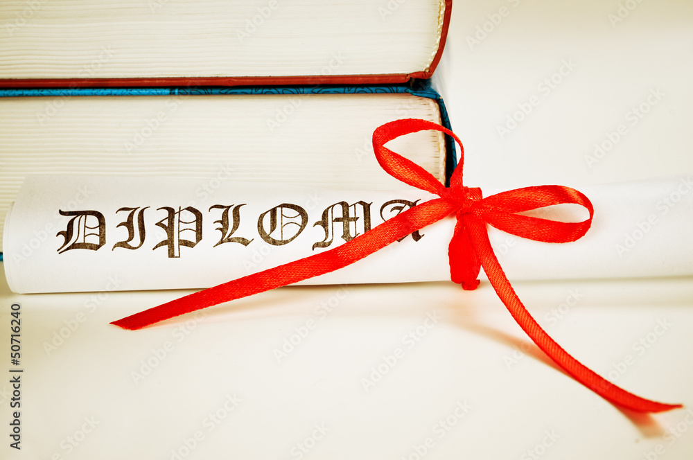 Diploma with red ribbon and books Diploma with red ribbon and books