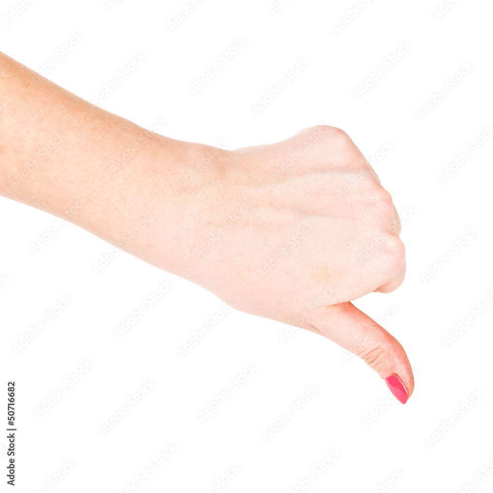 Female hand signaling thumb down Female hand signaling thumb down