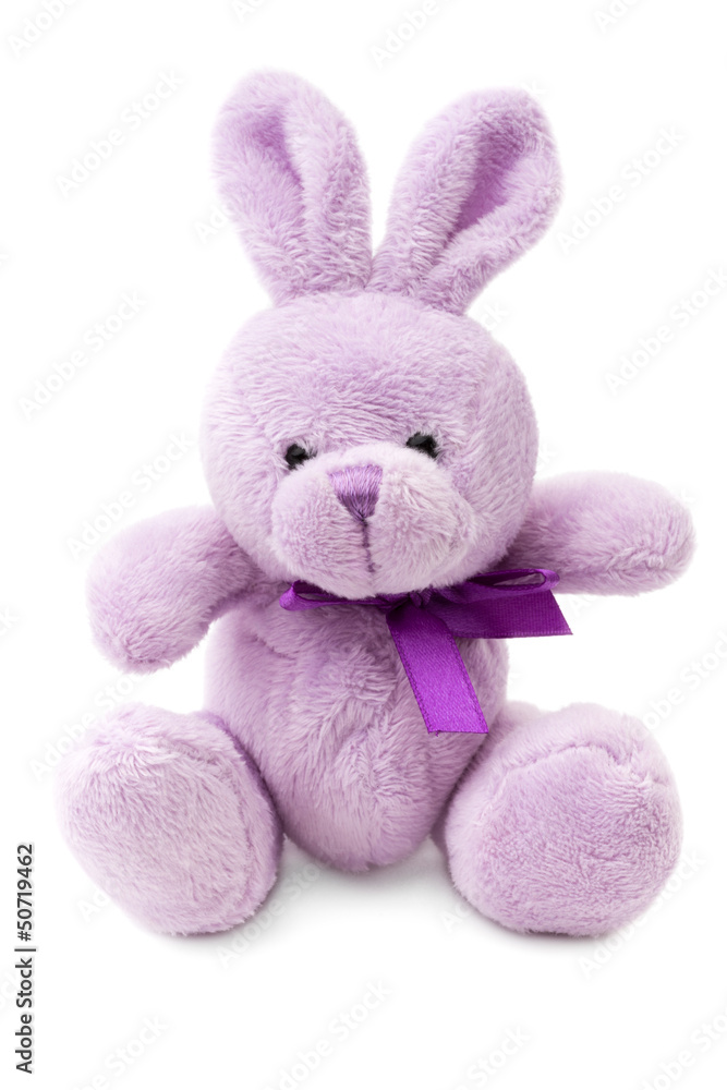 Fototapeta premium Toys: small pink or lilac rabbit, isolated on white background