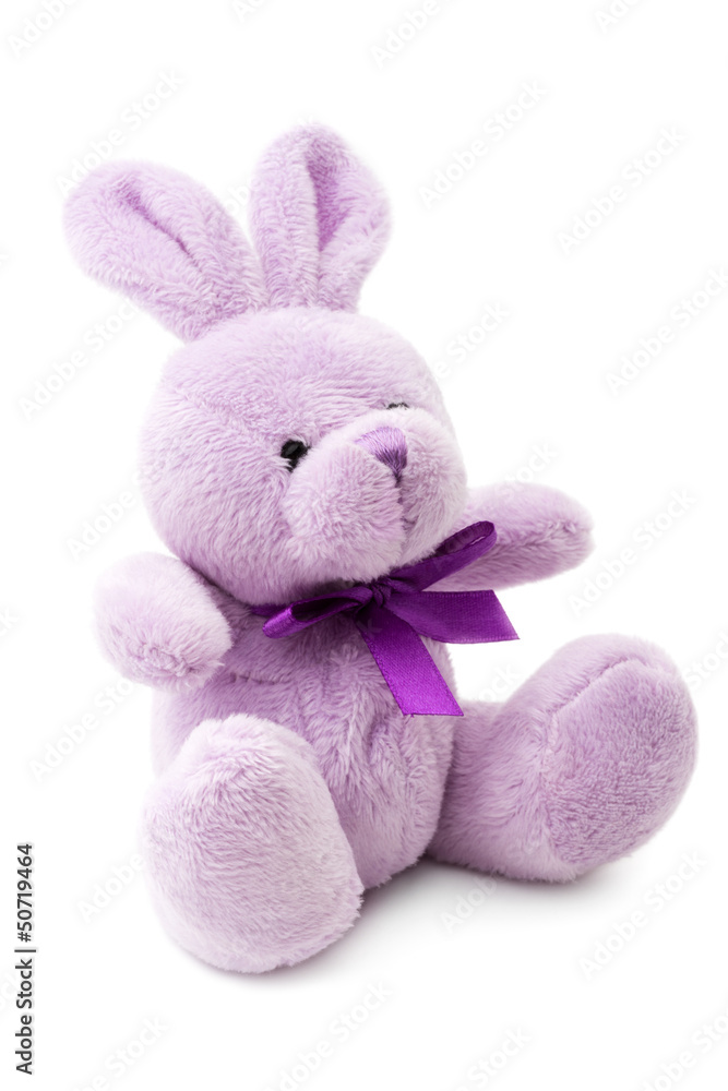 Naklejka premium Toys: small pink or lilac rabbit, isolated on white background