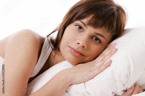 Girl thinking in bed