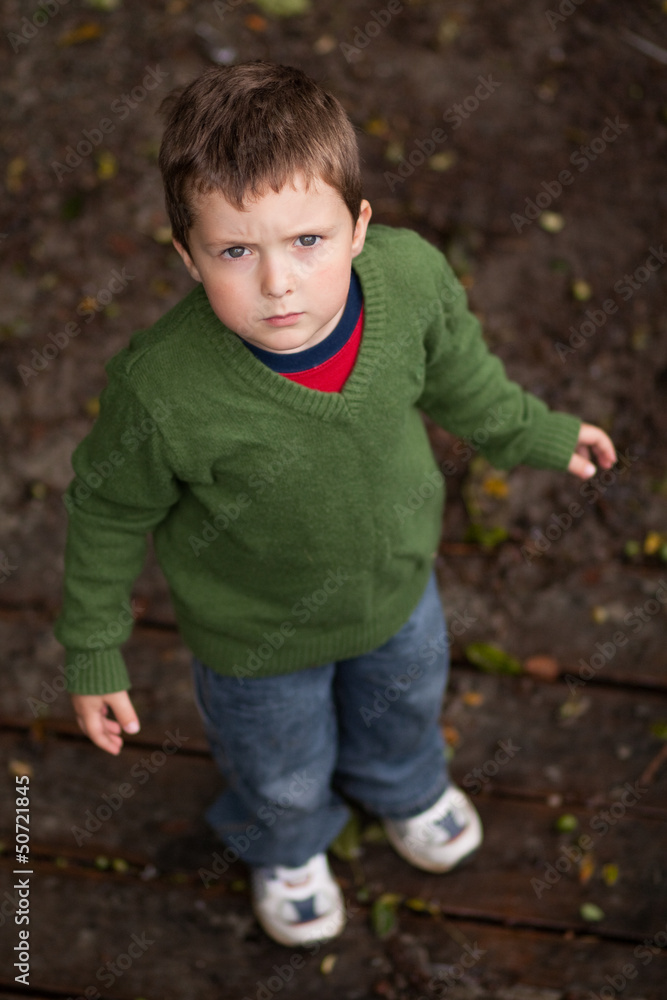 Young boy looking up Young boy looking up