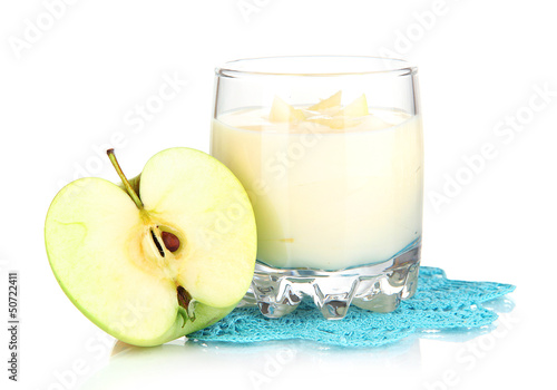 Delicious yogurt in glass with apple isolated on white