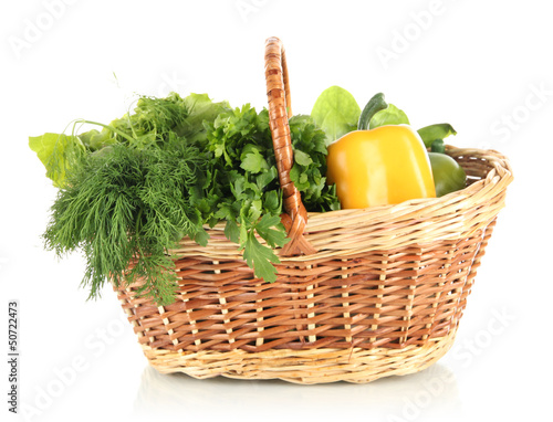 Useful herbs, mushrooms, and pepper in basket isolated on white