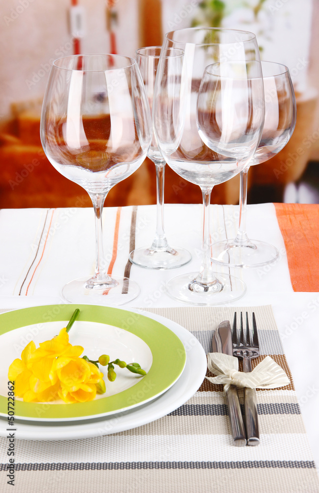 Table setting with glasses for different drinks Table setting with glasses for different drinks