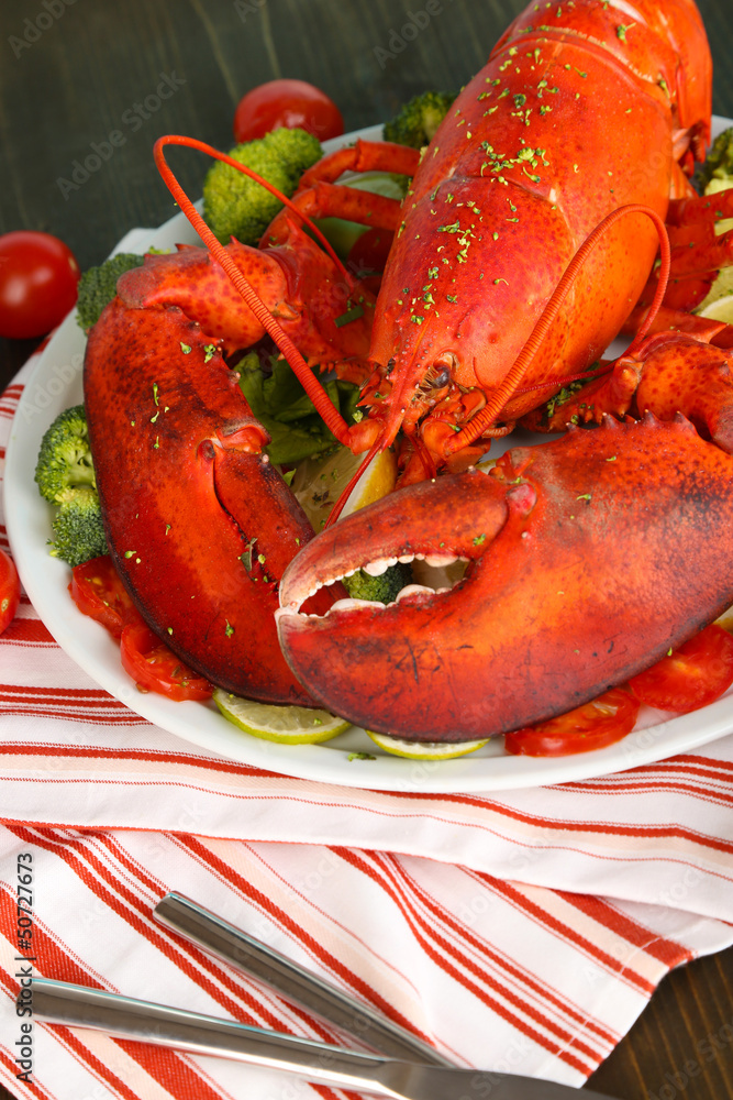Red lobster on platter on table close-up Red lobster on platter on table close-up