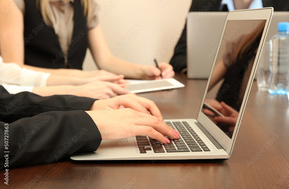 Female hands with digital tablet on office background. Female hands with digital tablet on office background.