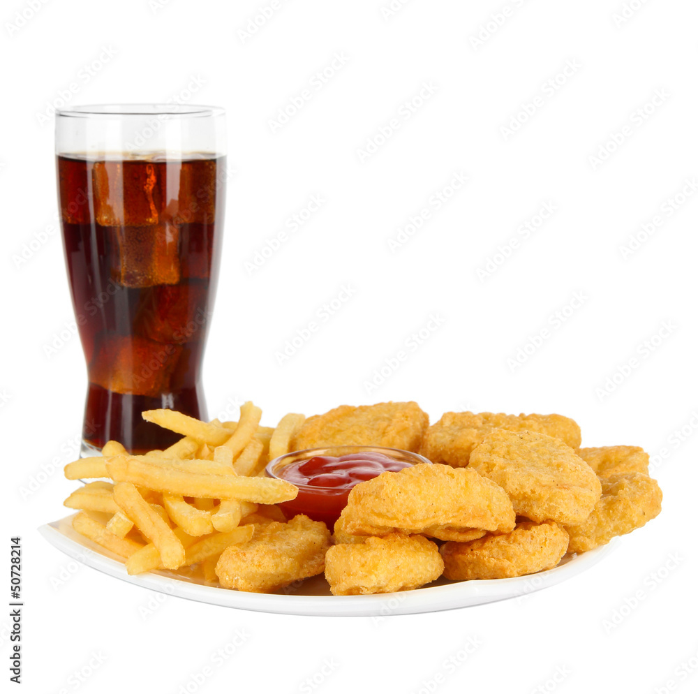 Fried chicken nuggets with french fries,cola and sauce isolated Fried chicken nuggets with french fries,cola and sauce isolated