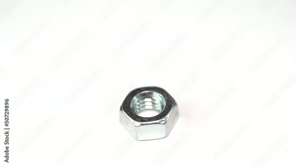 Nut rotates on a white background Nut rotates on a white background
