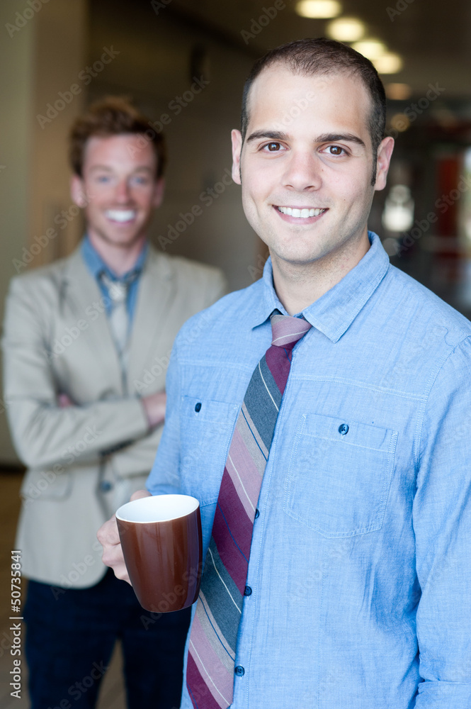 portrait of two young handsome businessmen portrait of two young handsome businessmen