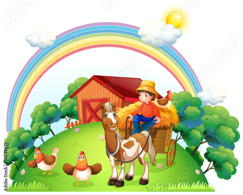 A boy riding in his farm cart