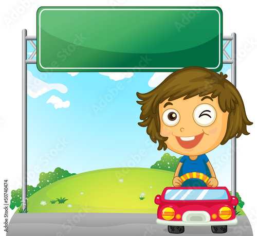 A playful little girl near an empty signage