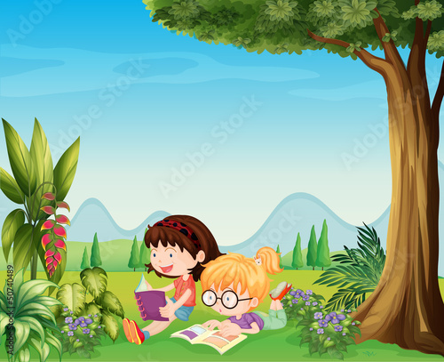 Two girls reading near the plants