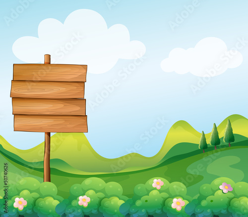 A wooden signboard in the hill
