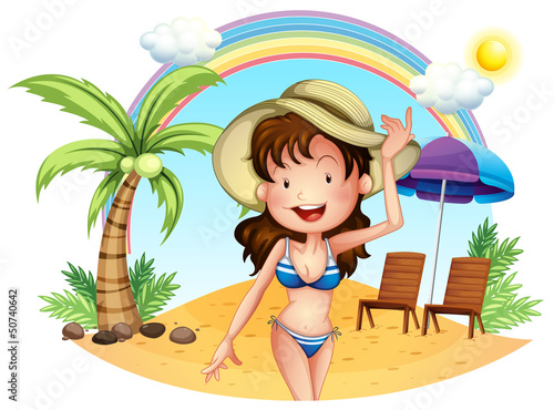 A girl in her swimsuit at the beach