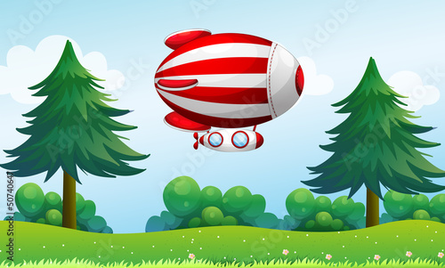 A stripe aircraft above the field