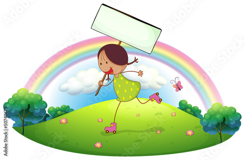 A girl in the hill holding a signboard