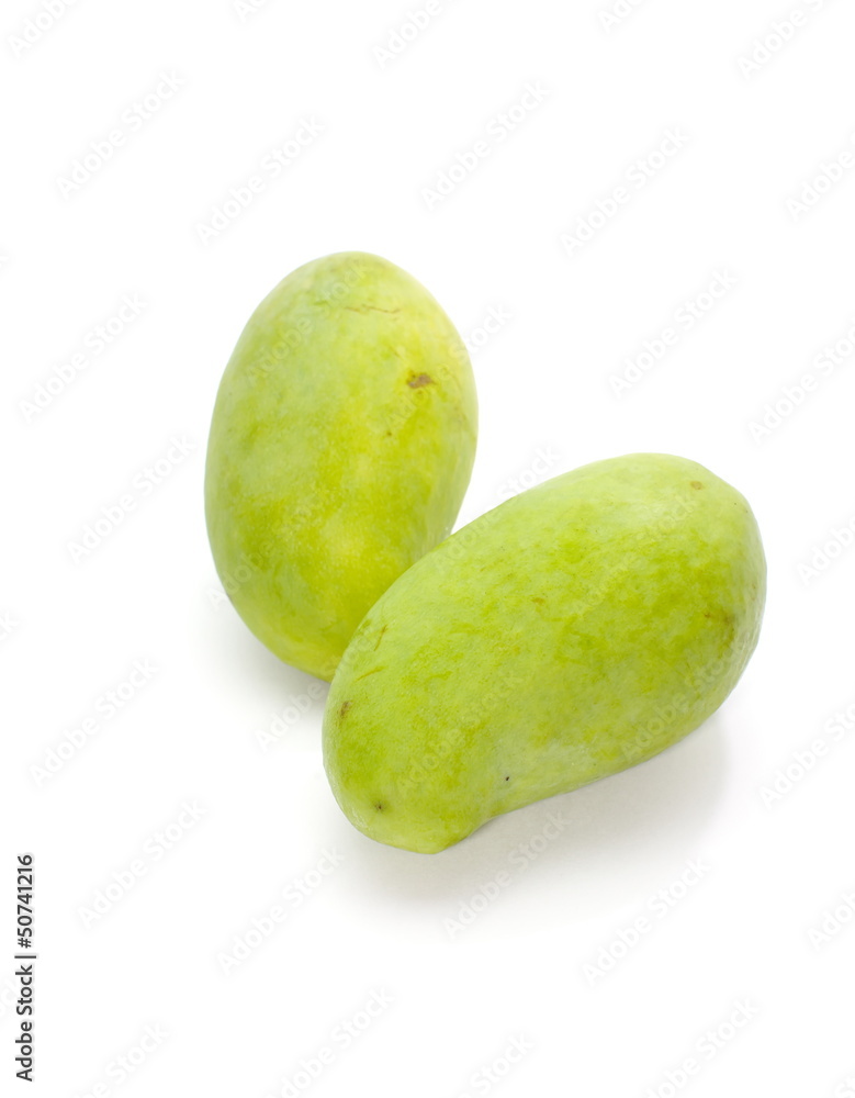 Green mango isolated on a white background Green mango isolated on a white background