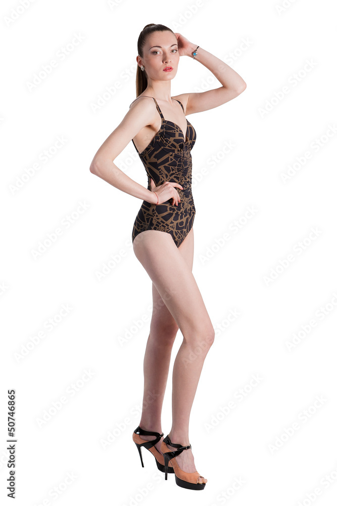 Full length portrait of a stunning young lady posing in lingerie