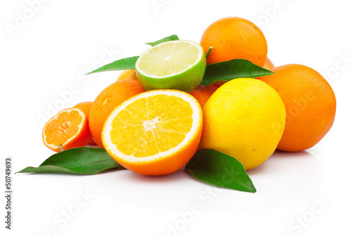 Set of fresh citrus fruits with green leaves  isolated on