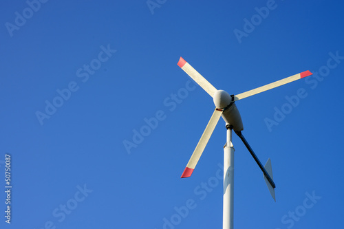 Windmill under blue sky photo