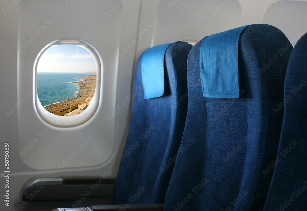 airplane seat and window
