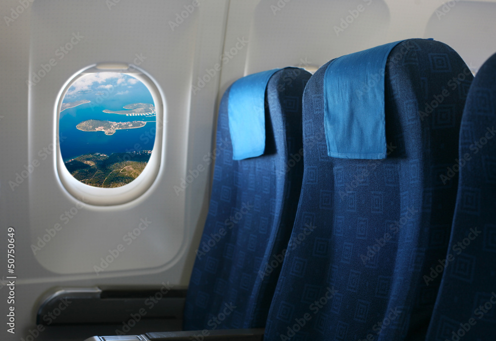 airplane seat and window