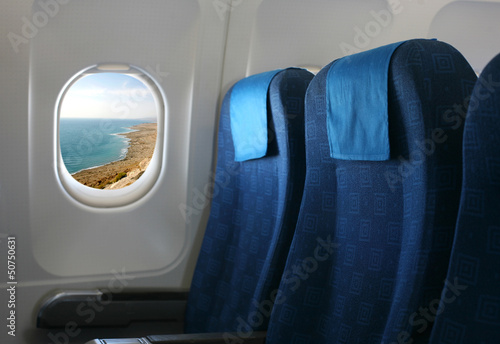 Obraz na płótnie airplane seat and window w salonie