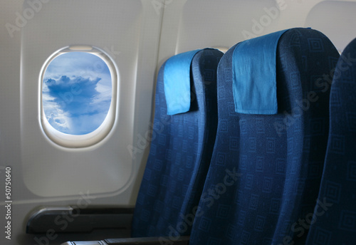 airplane seat and window photo