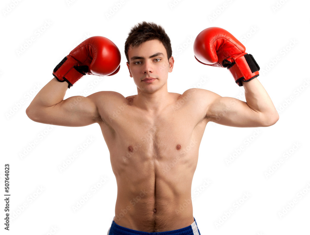 Portrait of boxer showing his muscles.