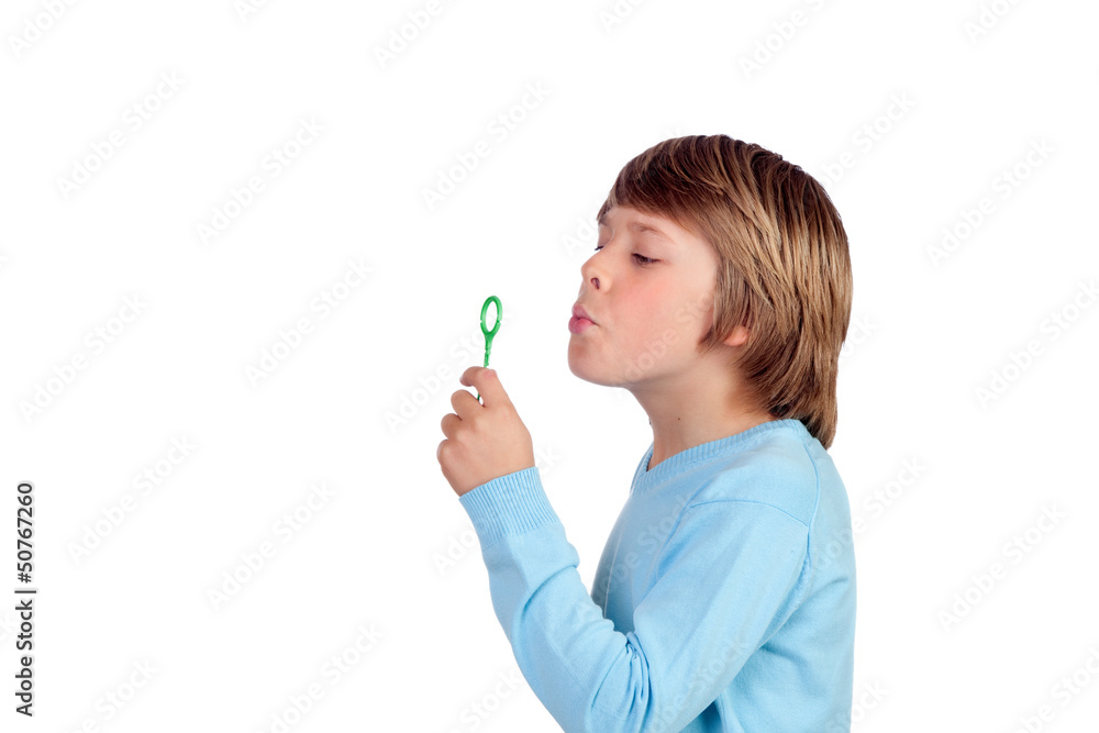 Adorable preteen boy blowing for make bubbles Adorable preteen boy blowing for make bubbles