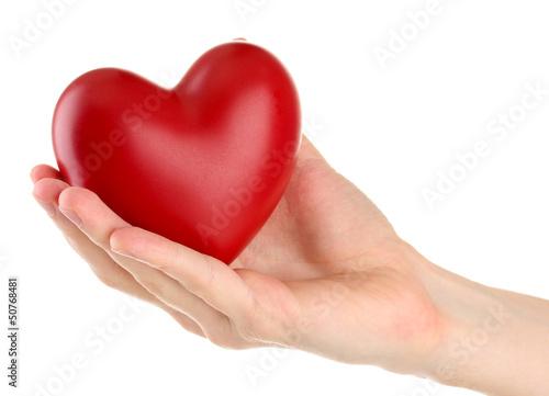 Red heart in man hand  isolated on white