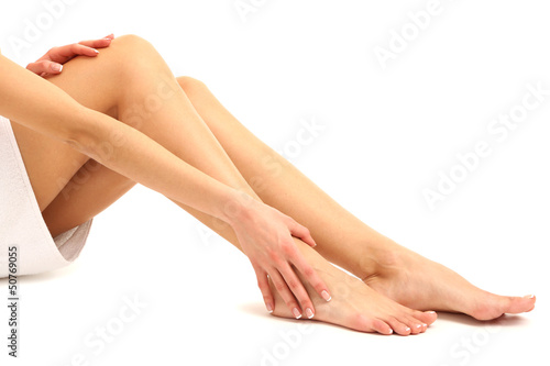 Beautiful woman legs, isolated on white © Africa Studio