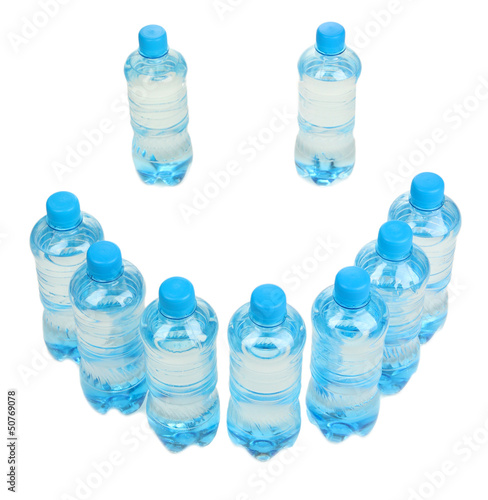 Different water bottles isolated on white
