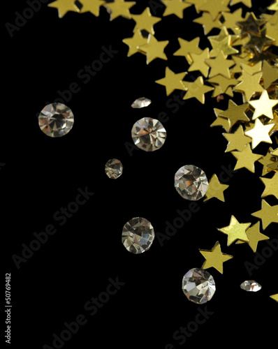 Beautiful shining crystals (diamonds) and golden stars,
