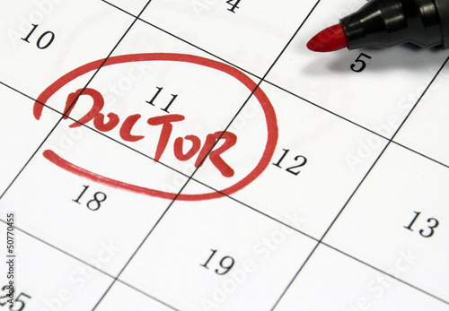 doctor date sign written with pen on paper